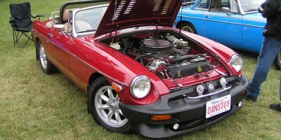 A beautiful red MG on display at a classic car rally. A beautiful red MG on display at a classic car rally.